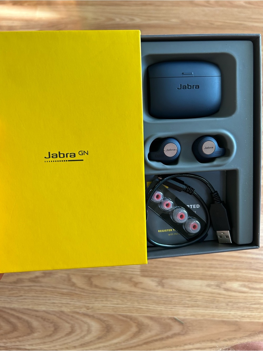 Jabra Active 65T True Wireless Earbuds in Navy Blue with Yellow Box